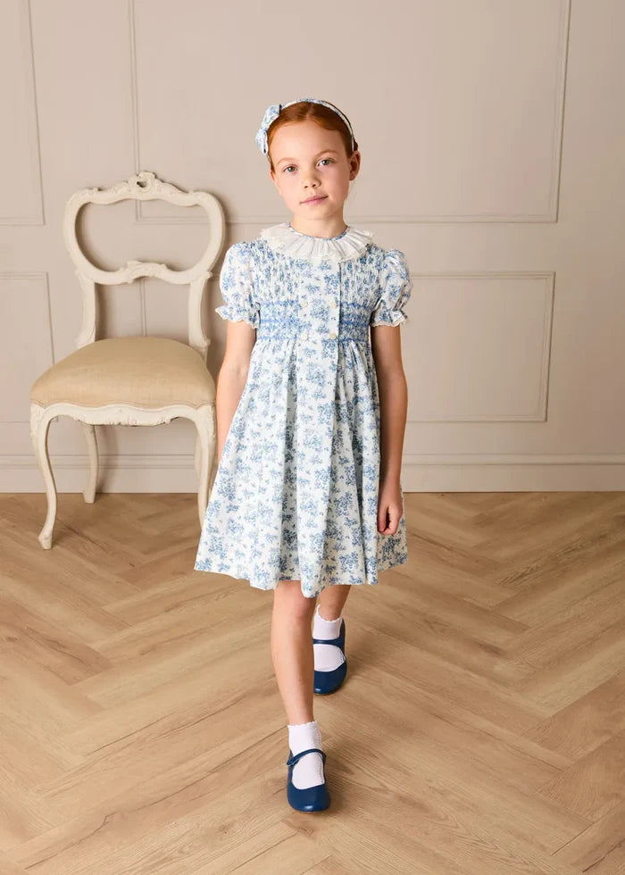Audrey Toile Hand Smocked Ruffle Collar Short Sleeve Dress in Blue (12mths- 10yrs) DRESSES from Pepa London