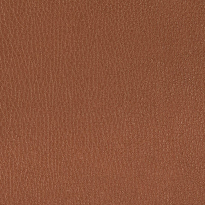 freifrau | leya wingback chair | x-base frame with tilt | cairo cognac leather + chesterfield stitch
