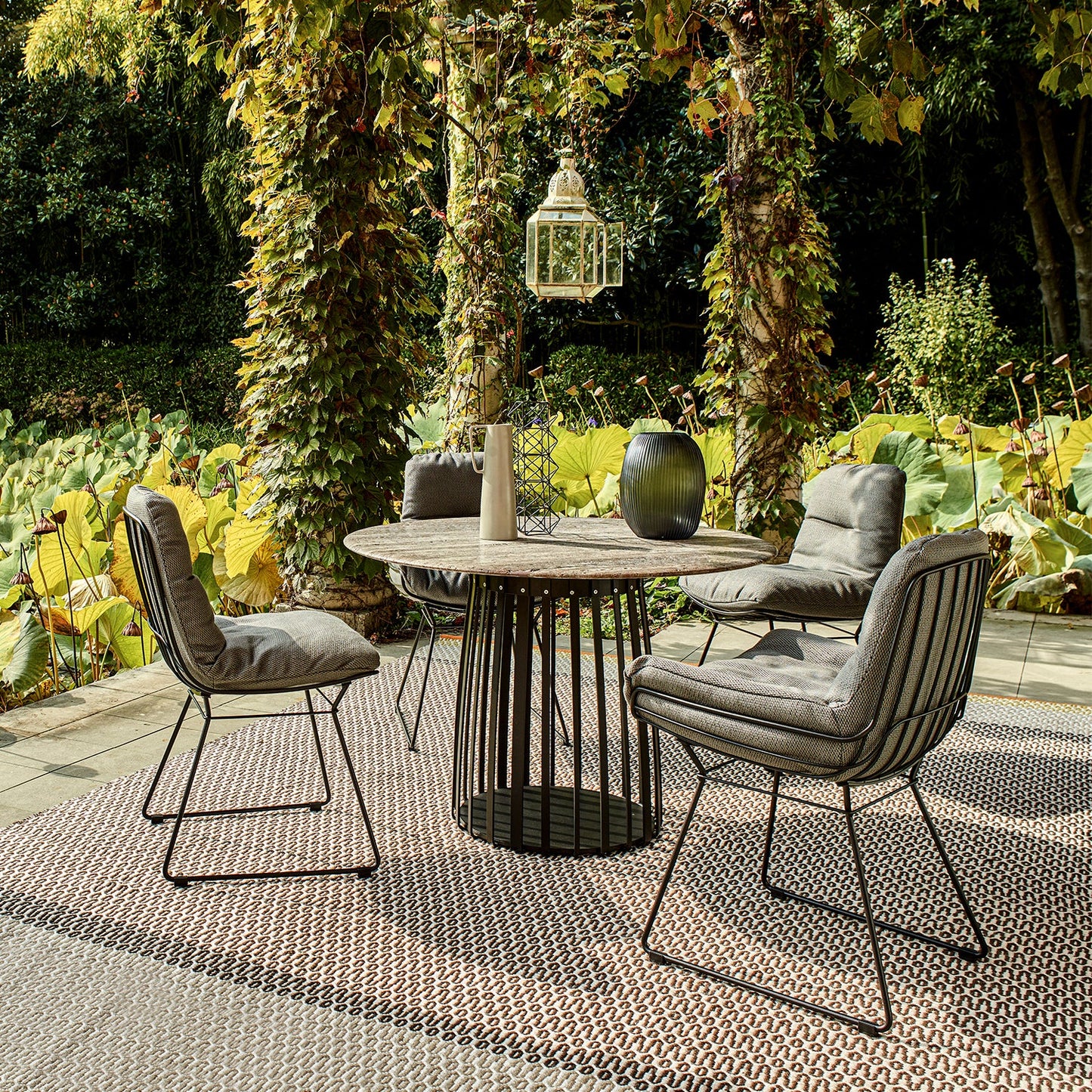 freifrau | leyasol chair | lopi chai + steel bronze glaze frame
