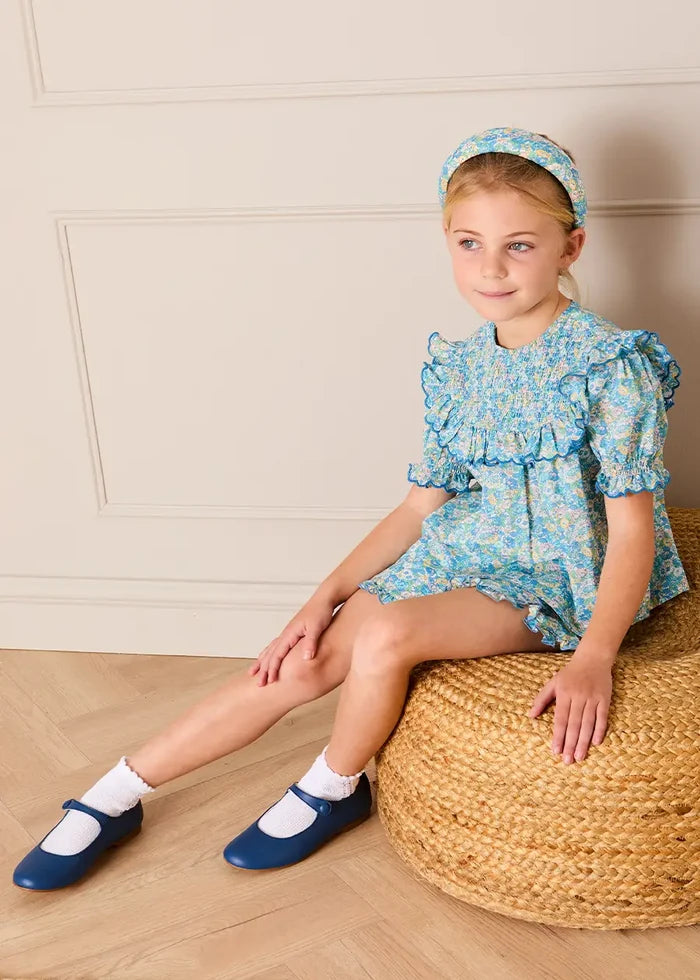 Leontyne Floral Scalloped Smocked Detail Short Sleeve Blouse in Blue Made with Liberty Fabric (2- 10yrs) BLOUSES from Pepa London