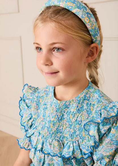 Leontyne Floral Scalloped Smocked Detail Short Sleeve Blouse in Blue Made with Liberty Fabric (2- 10yrs) BLOUSES from Pepa London
